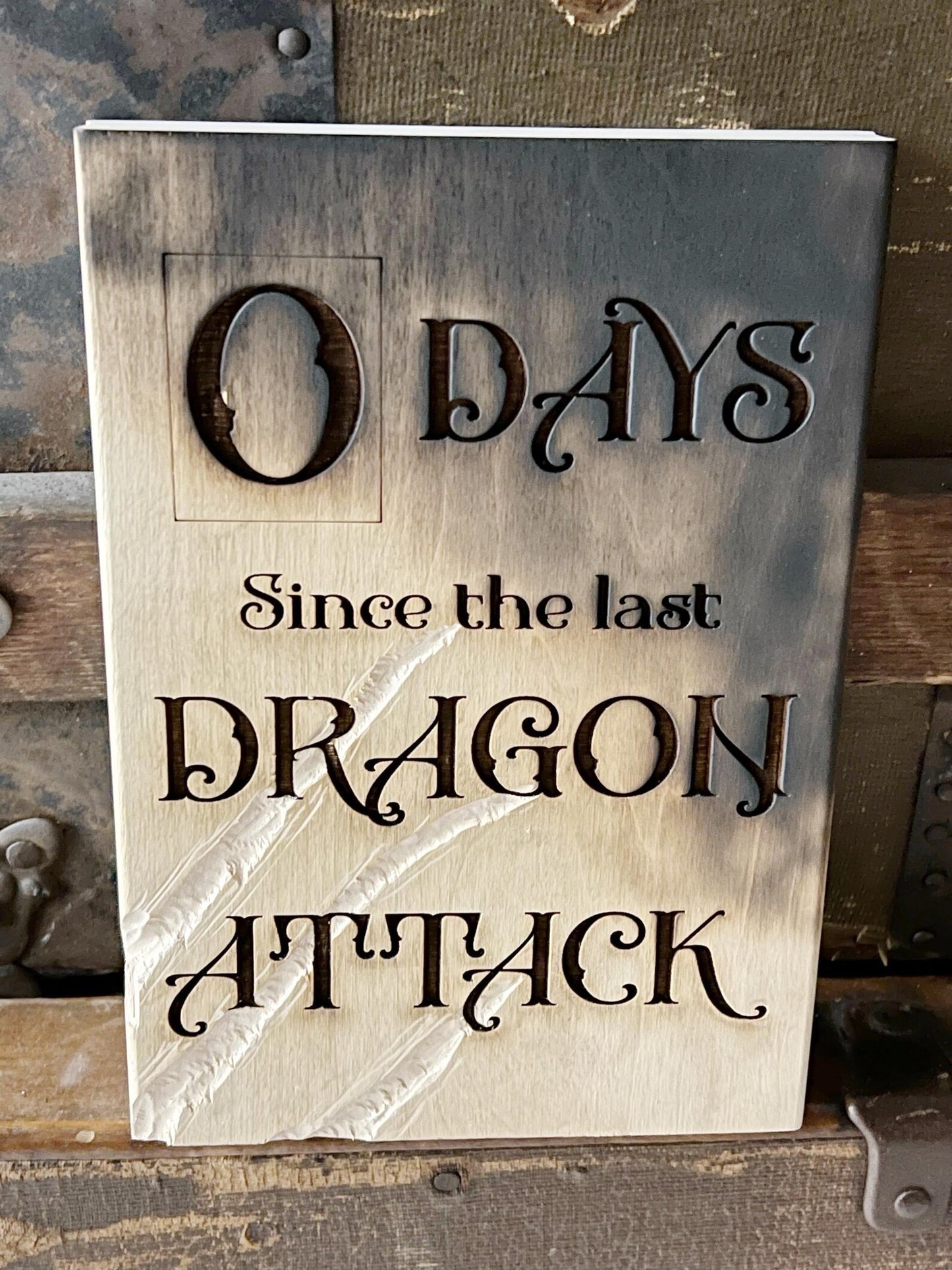Zero Days Since Dragon Attack Sign - 5.5x8 Inch Shelf Decor with Realistic Claw Marks and Char Aroma