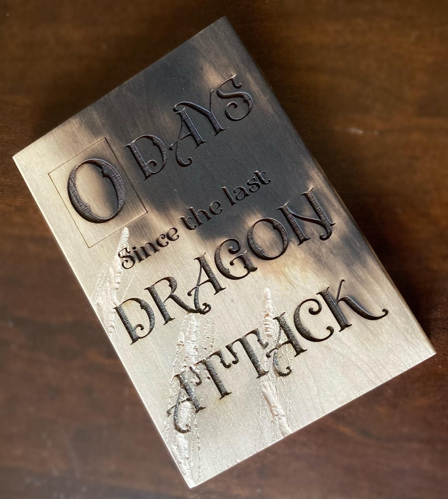 Zero Days Since Dragon Attack Sign - 5.5x8 Inch Shelf Decor with Realistic Claw Marks and Char Aroma